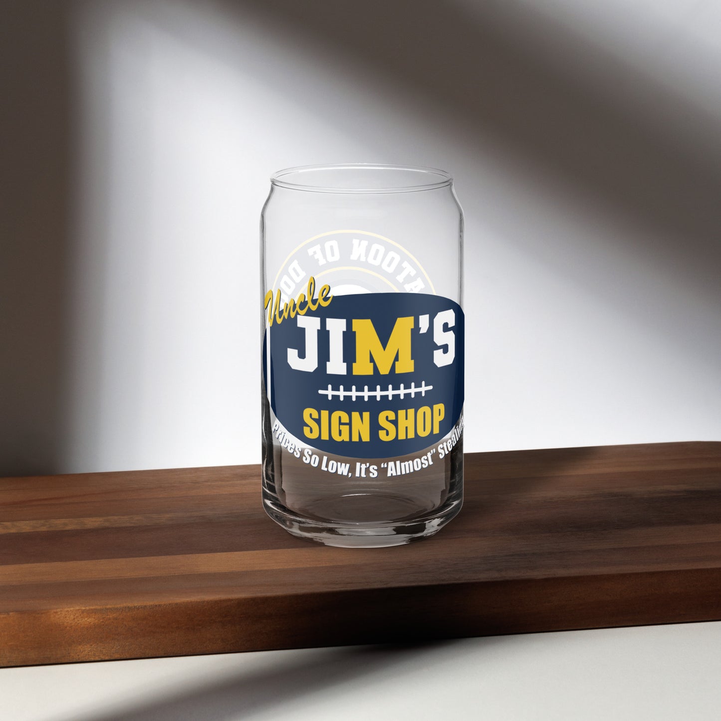 Uncle Jim's Sign Shop:  Can-shaped glass